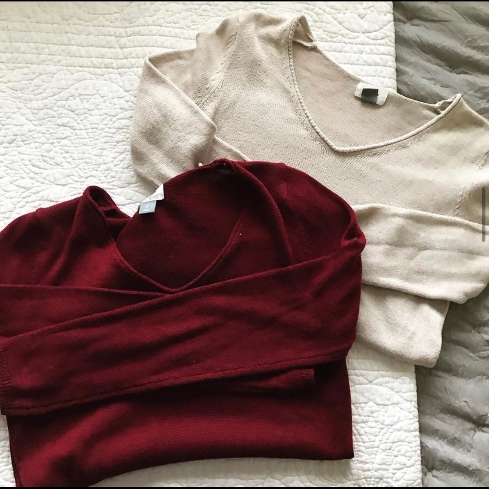 Beige and maroon sweaters